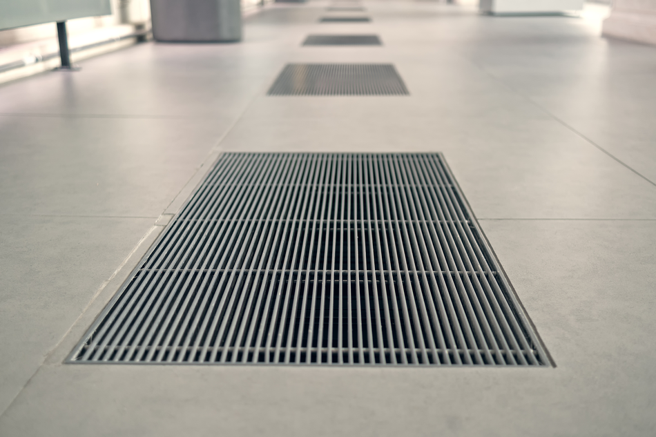 gratings-in-the-granite-floor-for-water-drainage